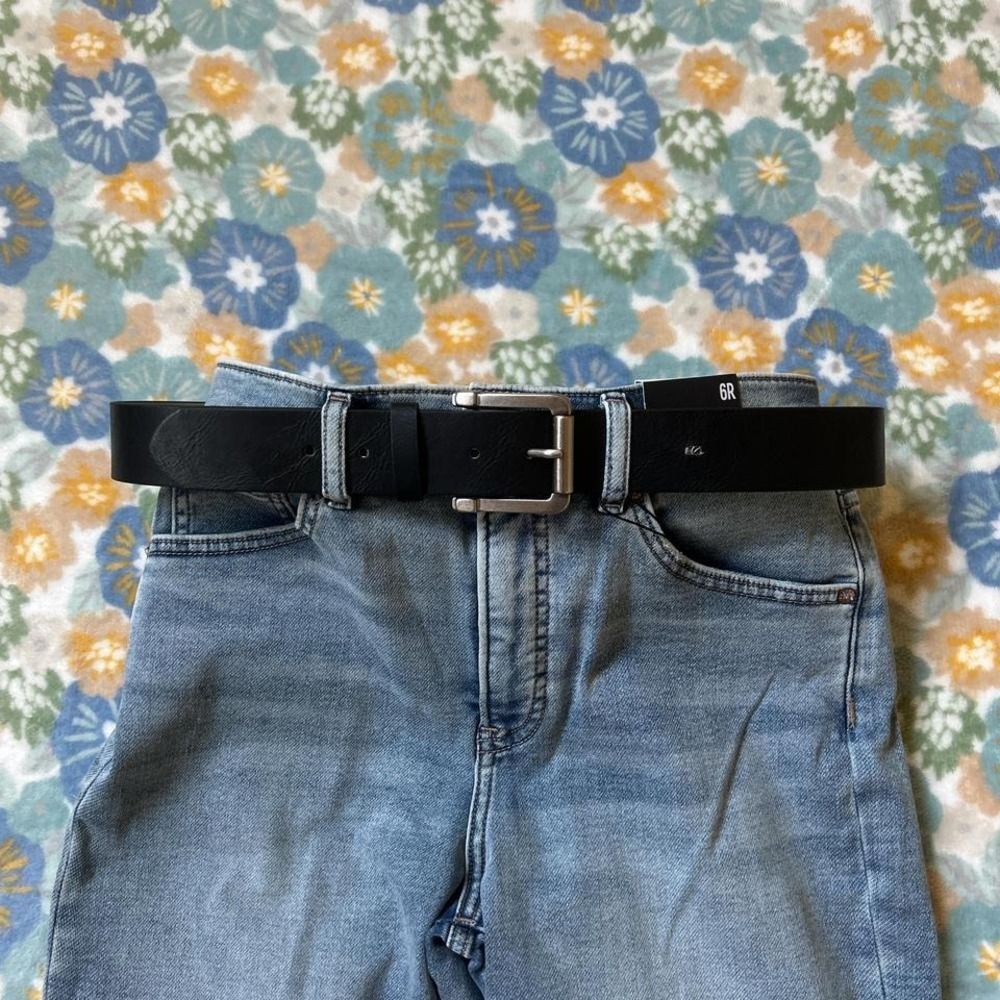 Black leather belt with silver buckle